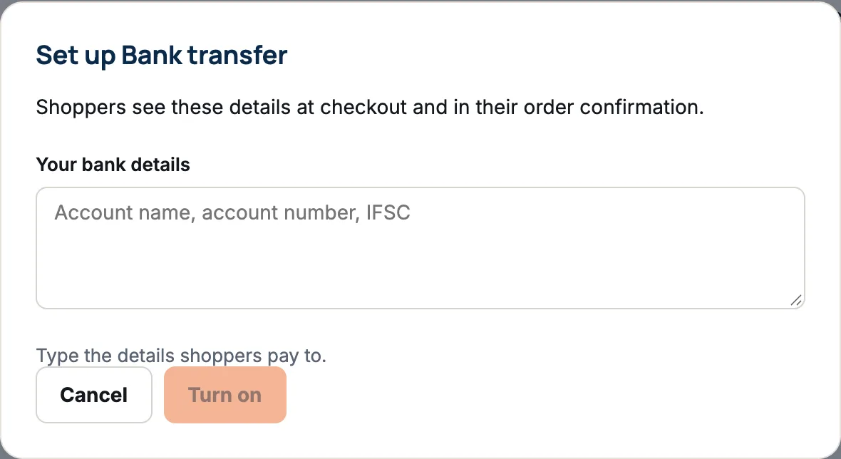 The Set up Bank transfer window: Shoppers see these details at checkout and in their order confirmation, a Your bank details box, and the buttons Cancel and Turn on.