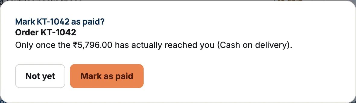 The Mark KT-1042 as paid? window: Only once the ₹5,796.00 has actually reached you (Cash on delivery), with the buttons Not yet and Mark as paid.