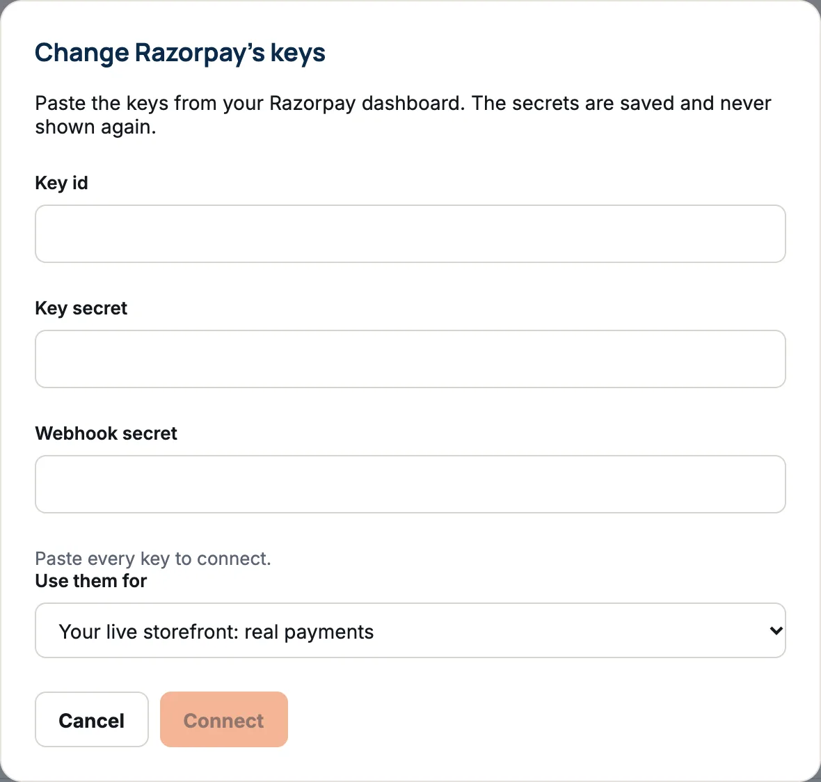 The Change Razorpay’s keys window with boxes for Key id, Key secret and Webhook secret, a Use them for list set to Your live storefront: real payments, and a Connect button.